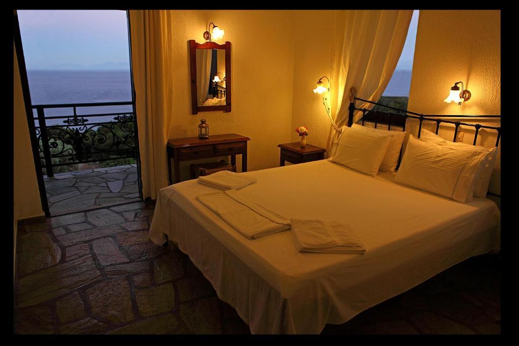 Mando Beachfront Stafylos Rom bilde