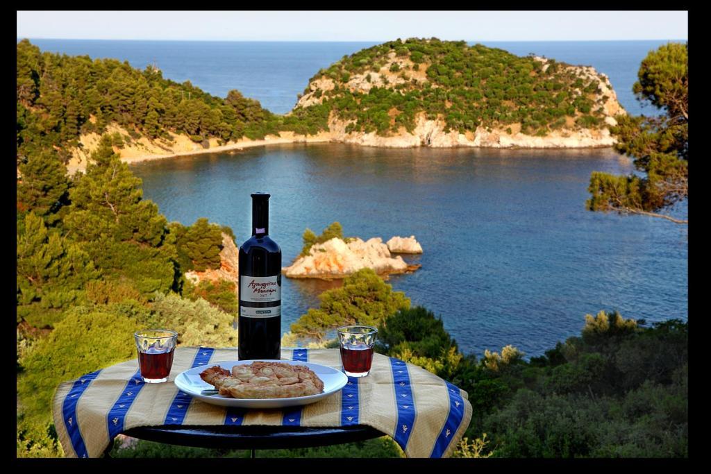 Mando Beachfront Stafylos Rom bilde
